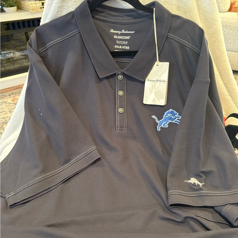 Tommy Bahama Men's Charcoal Polo Shirt with Blue Logo. NFL LIONS